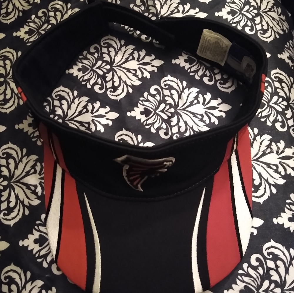 Preowned Reebok Atlanta Falcons  NFL football sun visor with adjustable strap.